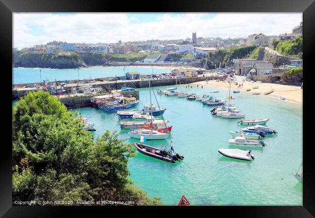 Harbour beach and Towan beach during High tide at Newquay in Cornwall. Framed Print by john hill