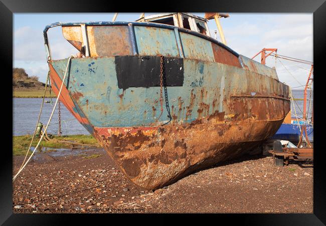 Derelict Rusting Boat Framed Print by chris hyde
