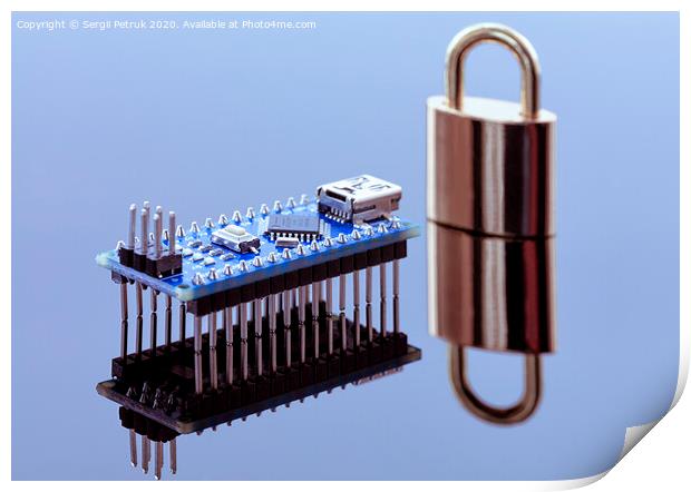 Padlock next to the computer chip - the concept of electronic data protection technology Print by Sergii Petruk
