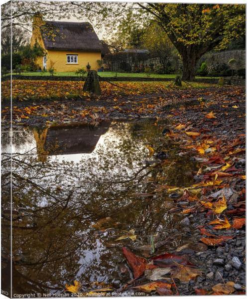 Yellow Thatched Cottage at Merthyr Mawr Canvas Print by Neil Holman