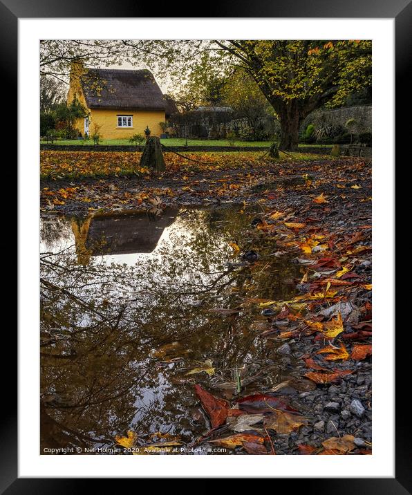Yellow Thatched Cottage at Merthyr Mawr Framed Mounted Print by Neil Holman