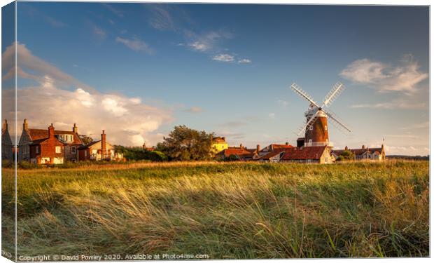 Evening light over Cley Mill Canvas Print by David Powley