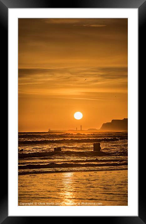 Sunrise over Whitby viewed from Sandsend. Framed Mounted Print by Chris North
