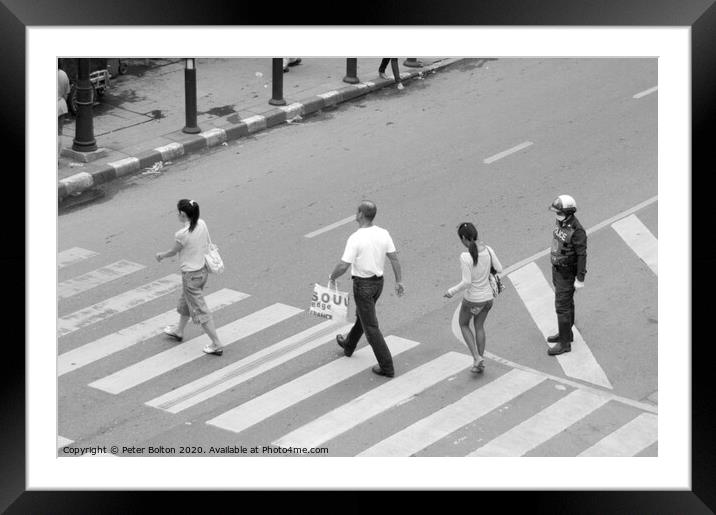 People on a pedestrian crossing in Bangkok. Framed Mounted Print by Peter Bolton