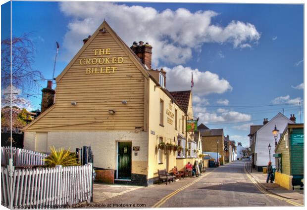 'The Crooked Billet' pub and High Street, Old Leigh, Essex, UK. Canvas Print by Peter Bolton