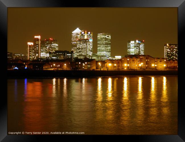 Nightscene of Canary Wharfe on the Isle of Dogs  Framed Print by Terry Senior