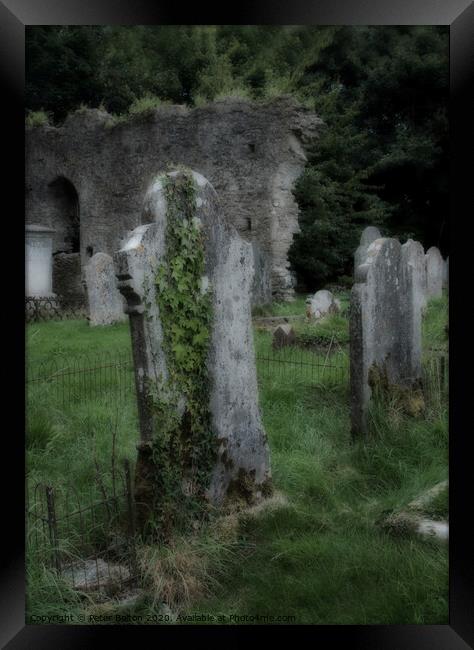 Tombstones in a disused graveyard at Buckfastleigh, Devon, UK Framed Print by Peter Bolton