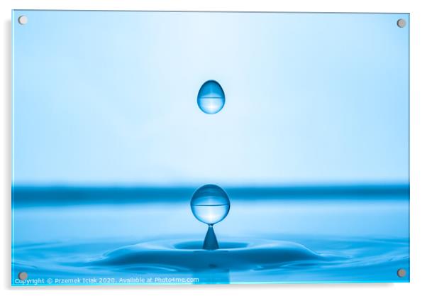 Water drop splashing into blue water surface Acrylic by Przemek Iciak