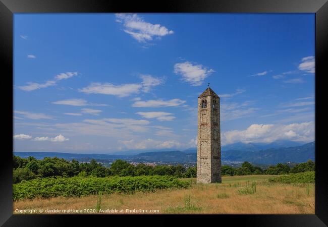 the solitary medieval stone bell tower Framed Print by daniele mattioda