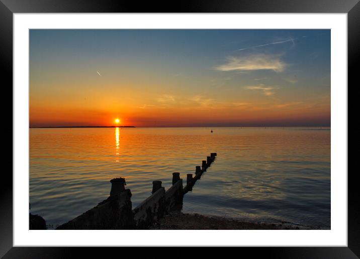 Setting sun in Whitstable Framed Mounted Print by Jonathan Moulton