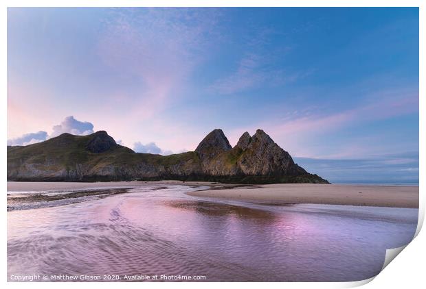 Beautiful colorful Summer sunrise landscape image of Three Cliffs Bay in South Wales Print by Matthew Gibson
