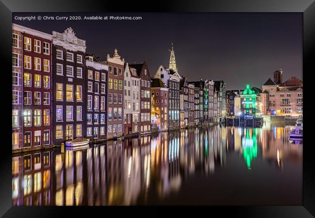 Amsterdam At Night Dancing Canal Houses Damrak  Framed Print by Chris Curry