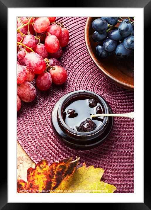 Jar of grape jam. Framed Mounted Print by Mykola Lunov Mykola