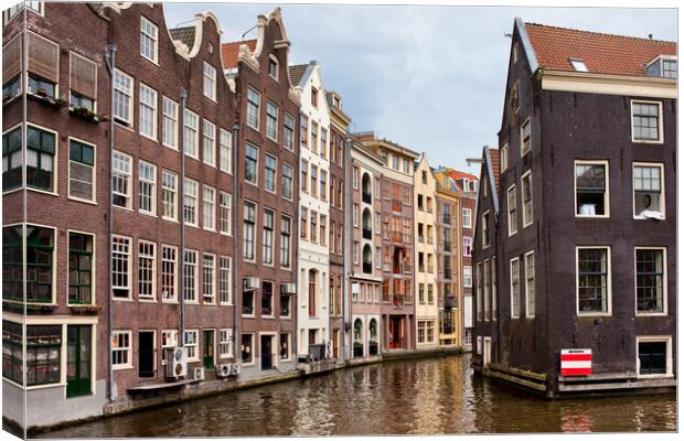 Amsterdam Canal Houses Canvas Print by Artur Bogacki