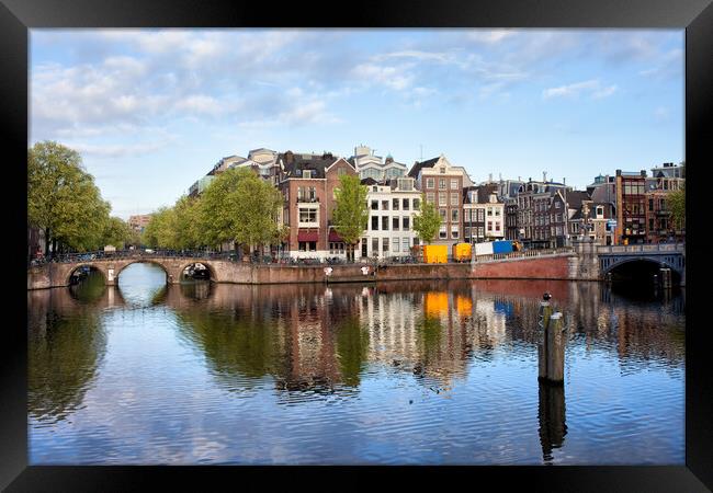 Amstel River in the City of Amsterdam Framed Print by Artur Bogacki