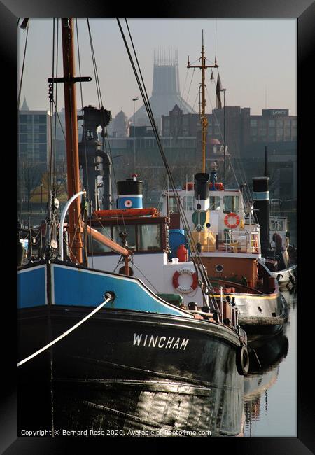Liverpool Canning Dock Cargo Vessel and Tug Boats Framed Print by Bernard Rose Photography
