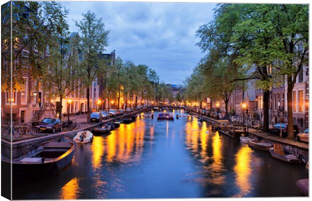 Canal in Amsterdam at Dusk Canvas Print by Artur Bogacki