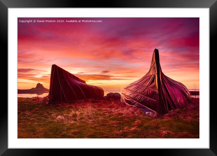 Boat huts and Lindisfarne Castle at sunrise Framed Mounted Print by David Preston