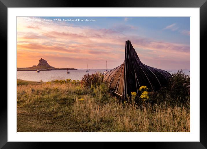 Boat hut and Lindisfarne Castle at sunrise Framed Mounted Print by David Preston