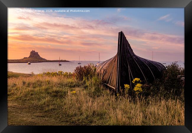 Boat hut and Lindisfarne Castle at sunrise Framed Print by David Preston