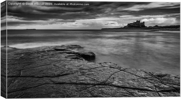 Bamburgh Castle view from Harkness Rocks Canvas Print by David Preston