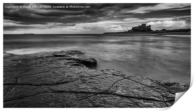 Bamburgh Castle view from Harkness Rocks Print by David Preston