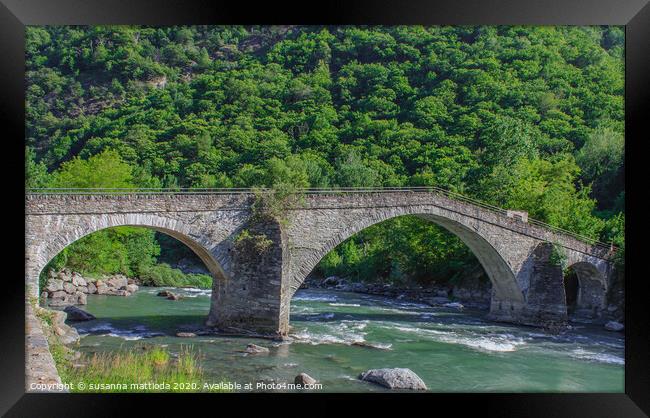  The medieval  bridge of Echallod in Arnad, Italy Framed Print by susanna mattioda