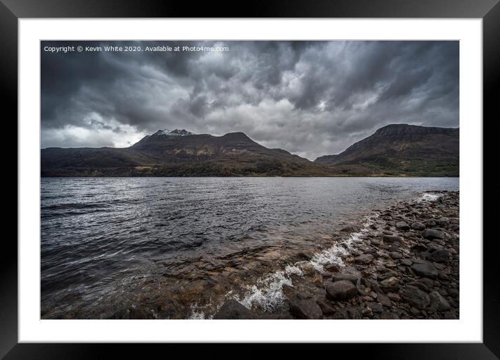 Storm clouds gather over Loch Maree Framed Mounted Print by Kevin White