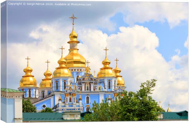 The famous Golden-domed Michael's Cathedral in Kyiv in the spring against the blue cloudy sky Canvas Print by Sergii Petruk
