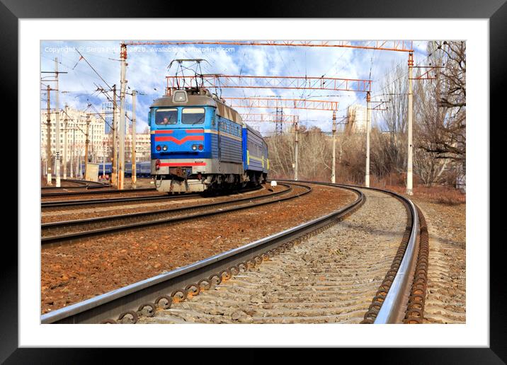 Perspective and turn of a multichannel railway for electric trains Framed Mounted Print by Sergii Petruk