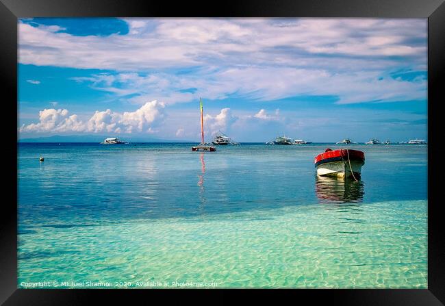 Boats moored off Panglao Island, Bohol in the Phil Framed Print by Michael Shannon