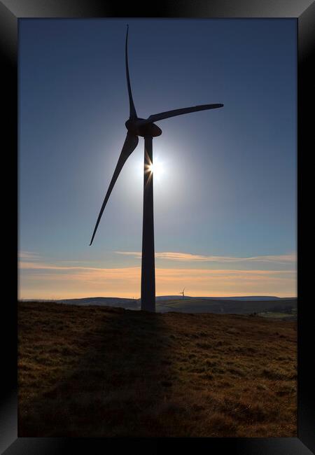 A wind turbine in Wales Framed Print by Leighton Collins