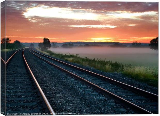 Misty Sunrise On The Tracks Canvas Print by Ashley Bremner