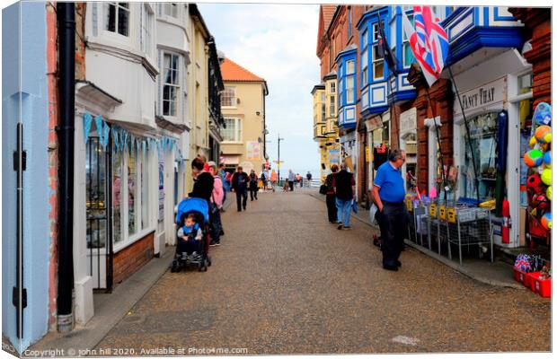 The High street at Cromer in Norfolk. Canvas Print by john hill