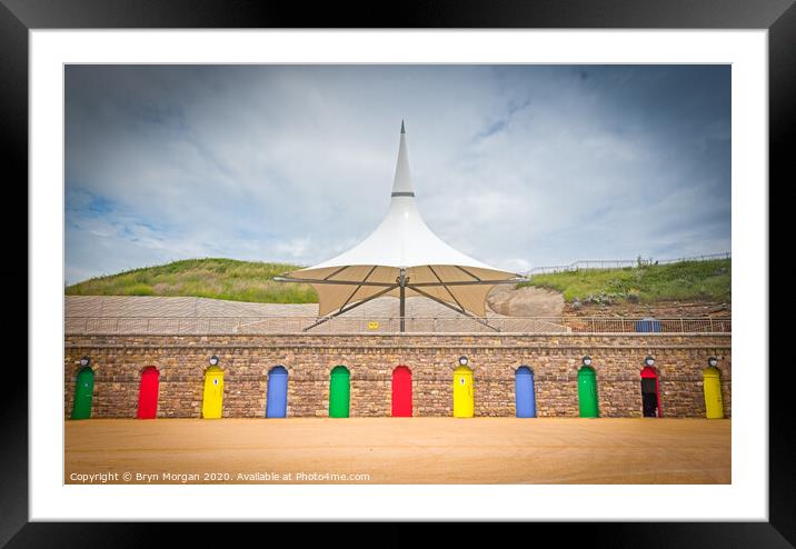 Barry island colourful doors and massive parasol Framed Mounted Print by Bryn Morgan