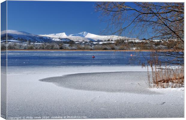 Llangorse Lake and Brecon Beacons in Winter. Canvas Print by Philip Veale