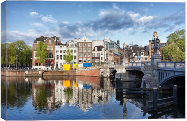 City of Amsterdam by the Amstel River Canvas Print by Artur Bogacki