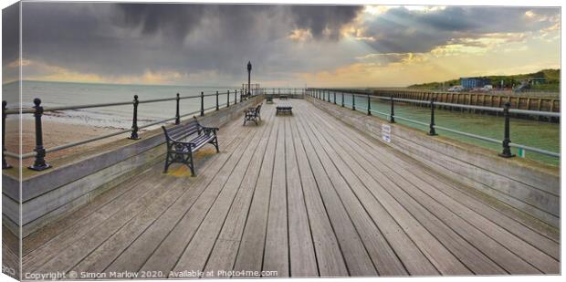 A look down the pier at Littlehampton Canvas Print by Simon Marlow