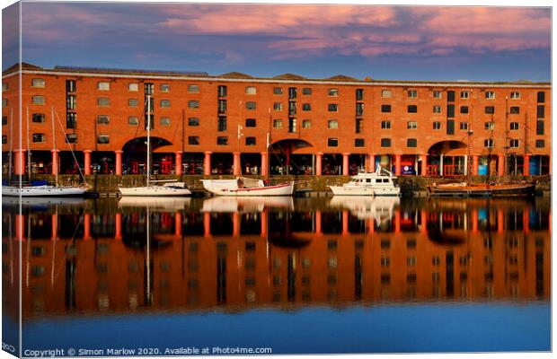 Small boats moored in Albert Dock Liverpool Canvas Print by Simon Marlow