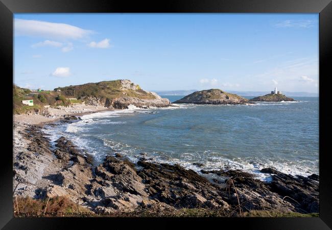 Bracelet Bay and Mumbles Lighthouse Framed Print by Peter Thomas