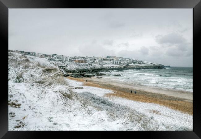Fistral Beach towards Pentire under snow Framed Print by Diane Griffiths