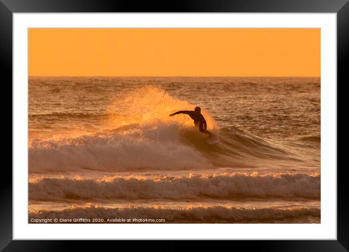 Surfing at Fistral Framed Mounted Print by Diane Griffiths