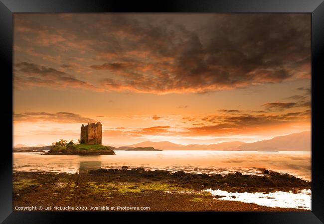 Majestic Sunset over Castle Stalker Scotland Framed Print by Les McLuckie