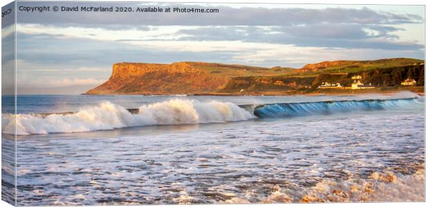 The tide surges at Ballycastle, Northern Ireland Canvas Print by David McFarland
