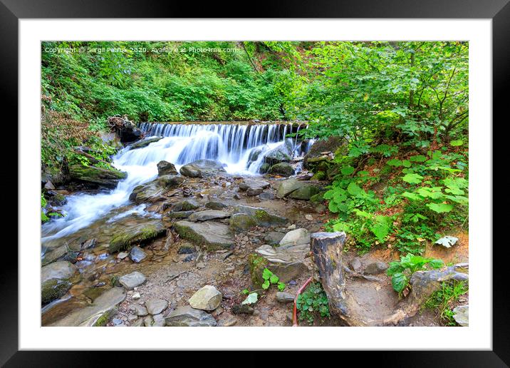 The picturesque and beautiful cascade waterfall of a mountain river in the gorge of the Carpathians. Framed Mounted Print by Sergii Petruk