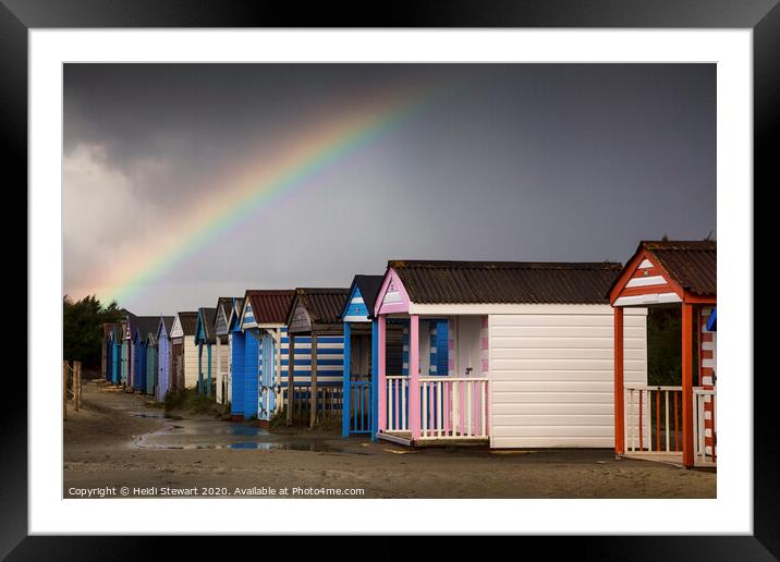 Rainbow over the Beach Huts Framed Mounted Print by Heidi Stewart