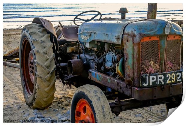 Rusty coastal tractor Print by Chris Yaxley
