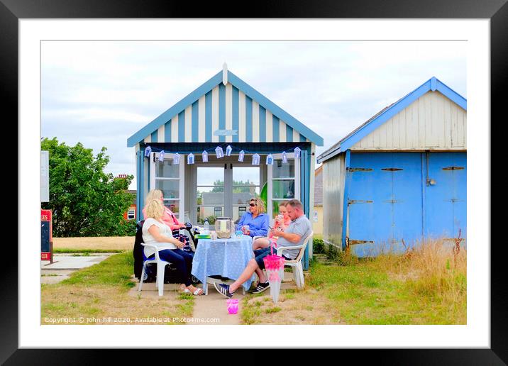 Beach hut tea party on the promenade at Sutton on Sea in Lincolnshire. Framed Mounted Print by john hill