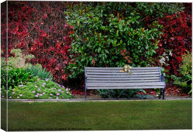 'Remembrance' , memorial seat. Canvas Print by Peter Bolton