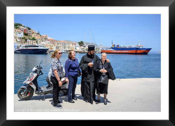 Greek orthodox priest with parishioners. Framed Mounted Print by Chris North